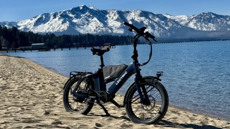 Lectric ONE electric commuter bike parked beside a waterfront trail