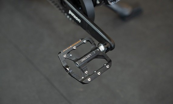 Close-up of the Lectric ONE pedals and crankset