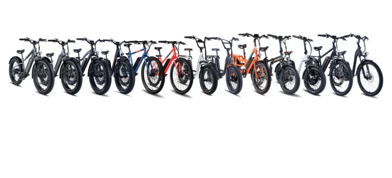 RadRover 6 Plus Collection | RideNova EV Multiple RadRover 6 Plus fat tire electric bikes lined up outdoors showcasing different color options