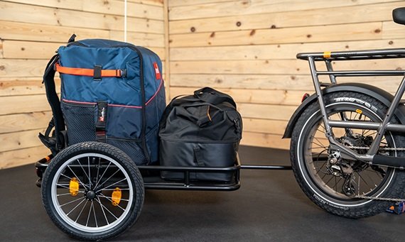 RadRunner 3 Plus electric bike towing a cargo trailer for extra hauling capacity