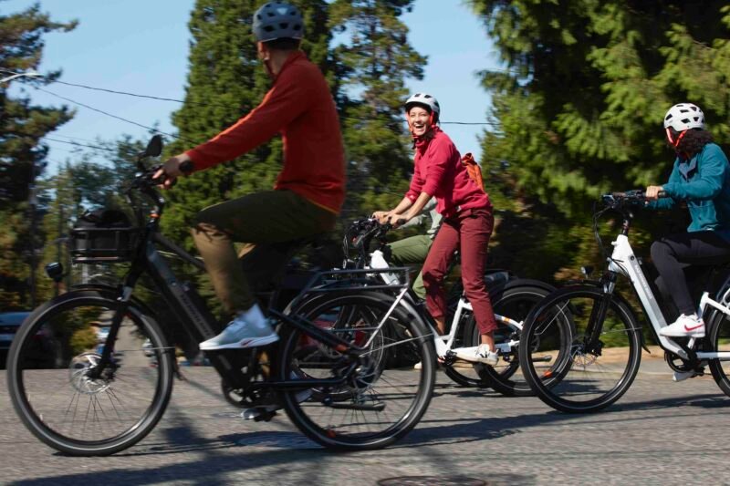 RadCity 5 Plus Step-Thru electric commuter bike displayed in a modern lifestyle setting
