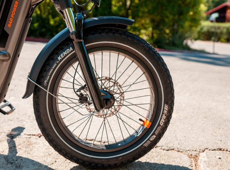 Front tire of the RadRunner 3 Plus utility electric bike with durable all-terrain tread