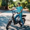 Rider cruising through city streets on the RadRunner 3 Plus utility electric bike