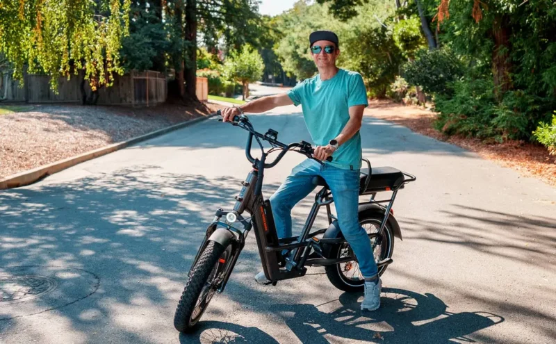 Rider cruising through city streets on the RadRunner 3 Plus utility electric bike