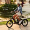 Lectric XP Trike cruising along a scenic country road