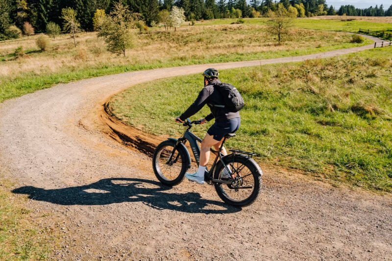 Aventon Aventure.3 electric bike lifestyle photo in a scenic outdoor adventure setting
