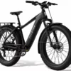 Aventon Aventure.3 Stealth electric bike riding off-road through rugged terrain