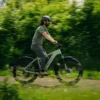 Rider exploring mountain trails on the Aventon Aventure.3 fat tire electric bike