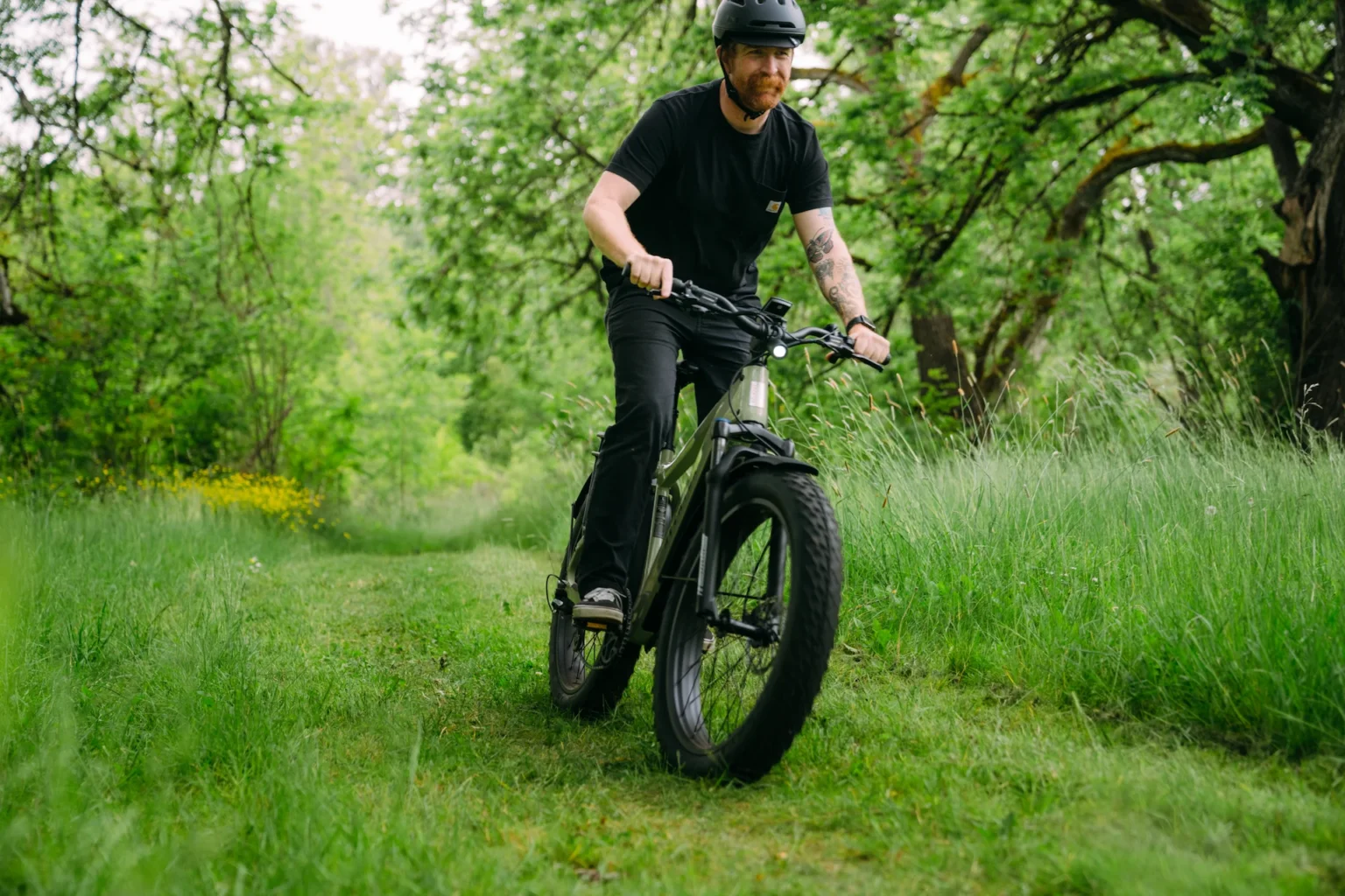 Rider cornering on the Aventon Aventure.3 fat tire electric bike