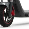 Front wheel and dual-tube suspension forks of an electric scooter against a clean white background.
