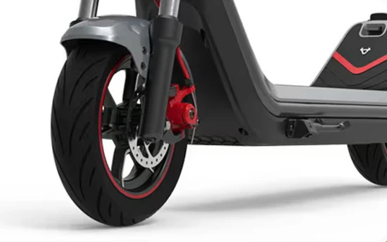 Front wheel and dual-tube suspension forks of an electric scooter against a clean white background.