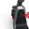 Close-up of an electric scooter deck showing the charging port with a red charging icon graphic next to it.